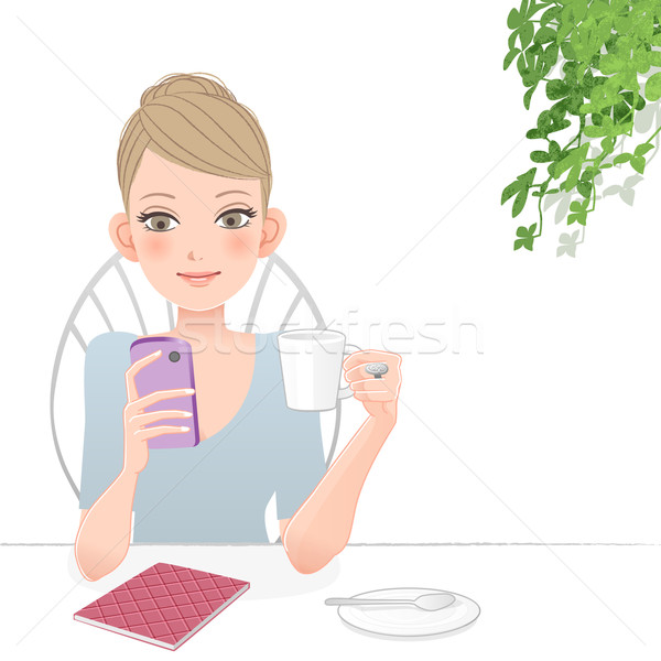 Stock photo: Pretty woman holding and looking into smart phone screen