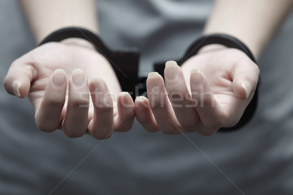 Letartóztatás emberi kezek bilincs közelkép vízszintes Stock fotó © Novic