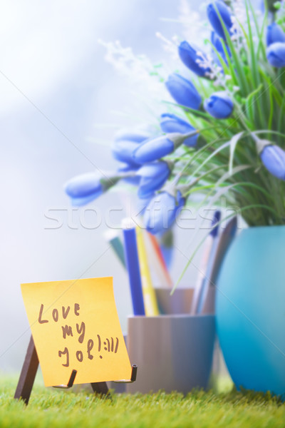 Adhesive note with Love my job text at green office Stock photo © Novic