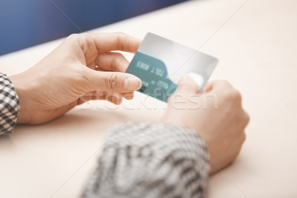 Nő hitelkártyák tart kettő műanyag vízszintes Stock fotó © Novic
