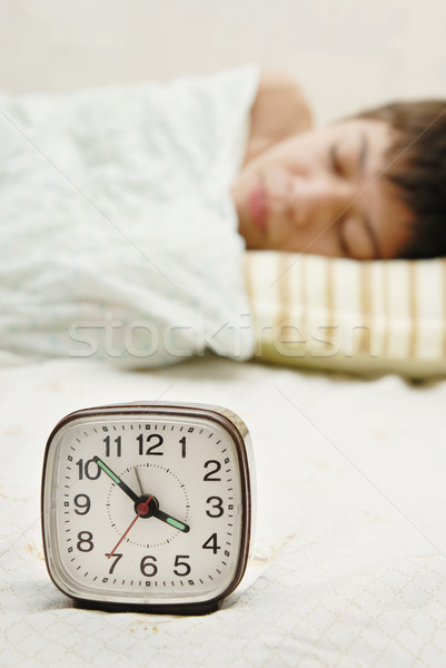 Alarm-clock and sleepyhead Stock photo © Novic