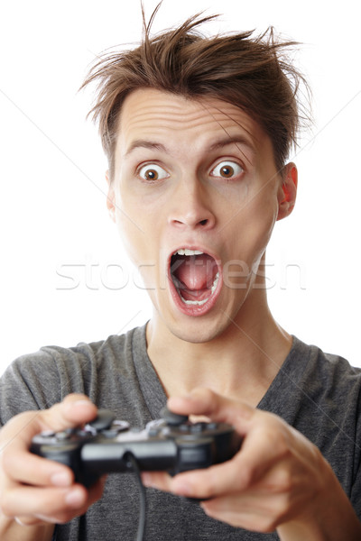 [[stock_photo]]: Ordinateur · fou · homme · joystick · jeux · internet