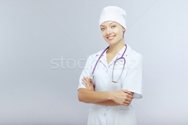 Сток-фото: хорошие · врач · улыбаясь · женщины · стетоскоп · серый