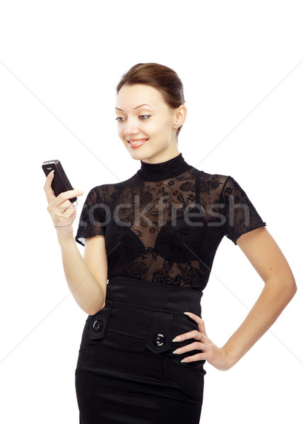 Sms gülen bayan okuma cep telefonu beyaz Stok fotoğraf © Novic