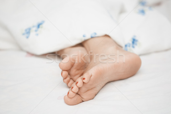Feet of sleeping woman Stock photo © Novic