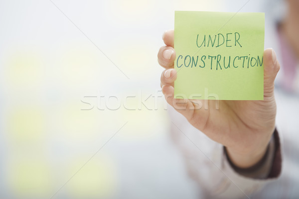 Under construction text on adhesive note Stock photo © Novic