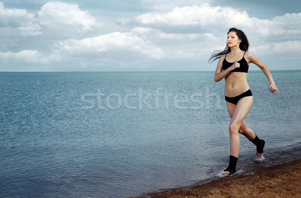 Run on the beach Stock photo © Novic