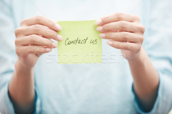 Sticky note with Contact us text Stock photo © Novic