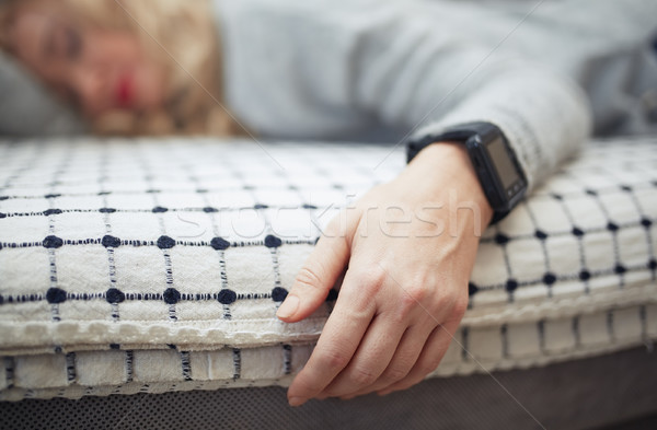 Woman sleeping with smart watch Stock photo © Novic