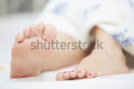 Feet of sleeping woman Stock photo © Novic