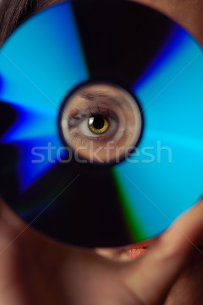 Eye and compact disk Stock photo © Novic