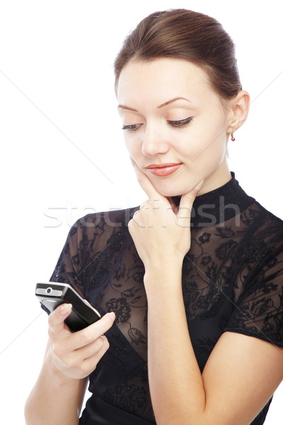 Sms düşünme bayan cep telefonu okuma kız Stok fotoğraf © Novic