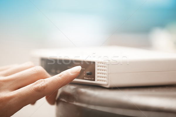 Drótnélküli modem emberi kéz közelkép vízszintes fotó Stock fotó © Novic