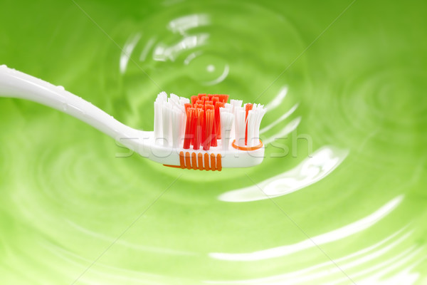 Zahnhygiene Foto Zahnbürste grünen Wasser Stock foto © Novic