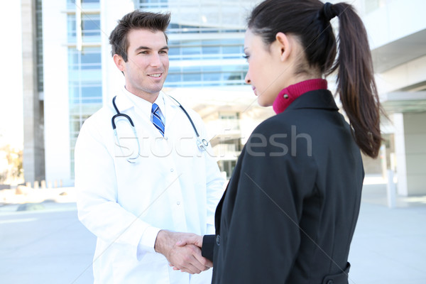 Médico aperto de mão paciente homem mulher hospital Foto stock © nruboc