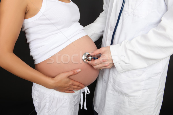 Foto stock: Médico · mujer · embarazada · estetoscopio · negro · mujer · mano