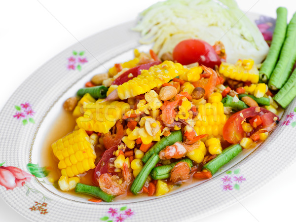 fresh vegetable salad with corn,tomato, peanut and dried shrimp. Stock photo © nuiiko