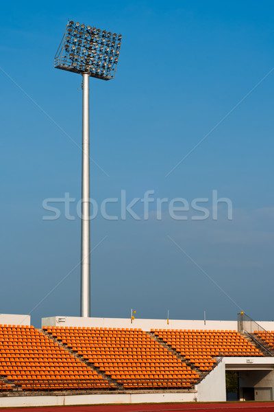 Contemporary stadium Orange seat light and track Stock photo © nuttakit