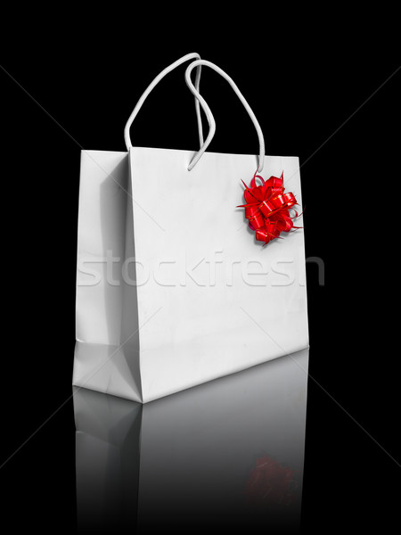 Stock photo: White paper bag and red bow