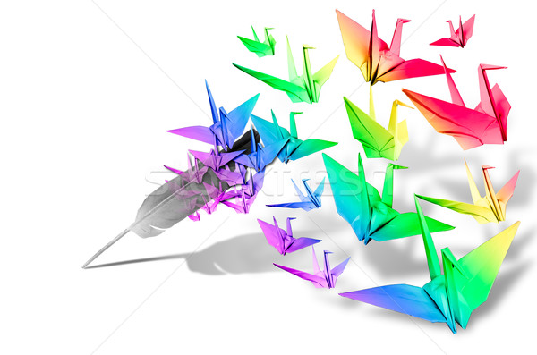 Feather pen and paper bird fly on white background Stock photo © nuttakit