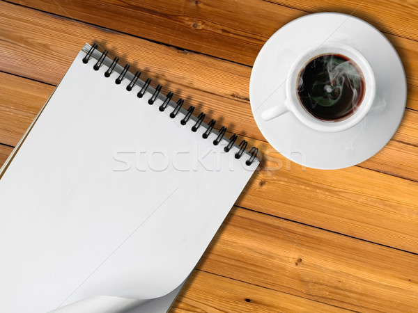 Notebook and White cup of hot coffee Stock photo © nuttakit