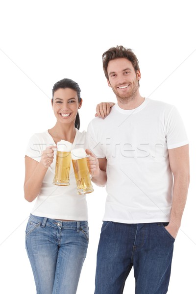 Happy couple clinking glasses laughing Stock photo © nyul