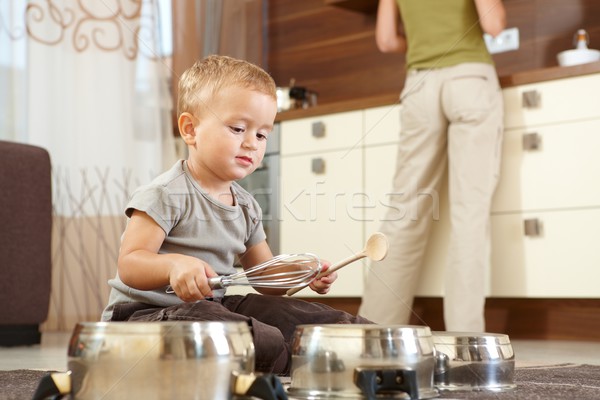 Küçük erkek oynama mutfak oturma halı Stok fotoğraf © nyul