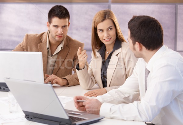 Young professionals teamworking in meeting room Stock photo © nyul