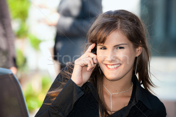 Stock photo: Businesswoman talking on mobile