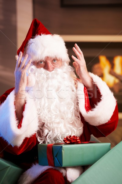 Santa looking troubled having too much work Stock photo © nyul