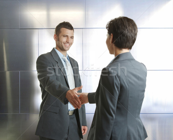 Handshake souriant affaires femme d'affaires serrer la main modernes [[stock_photo]] © nyul