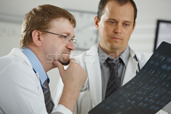 Doctors consluting diagnosis Stock photo © nyul