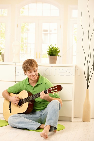 Guy playing guitar Stock photo © nyul