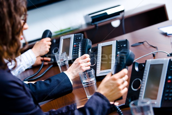 ügyfélszolgálat közelkép kezek tart telefon iroda Stock fotó © nyul