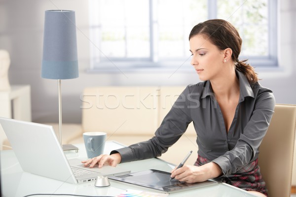 Jovem gráfico estilista trabalhando casa laptop Foto stock © nyul