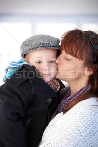 Mother kissing cute toddler Stock photo © nyul