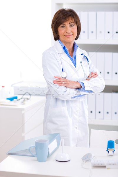 Female doctor working at office Stock photo © nyul