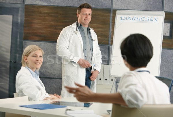 Doctor doing presentation for colleagues Stock photo © nyul