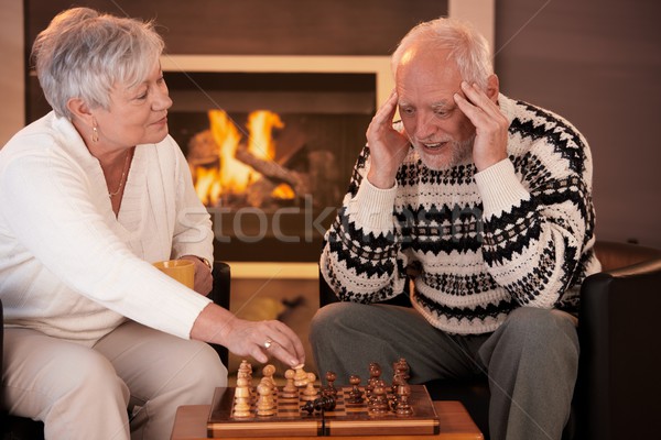 Spielen Schach home lächelnde Frau gewinnen Stock foto © nyul