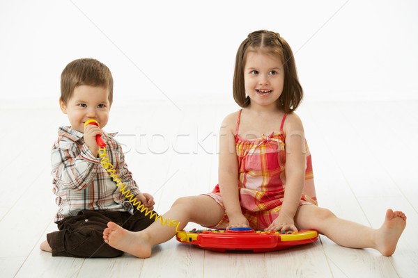 Küçük çocuklar oynama oyuncak enstrüman mutlu Stok fotoğraf © nyul