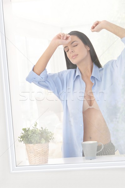 álmos nő visel melltartó férfi póló Stock fotó © nyul