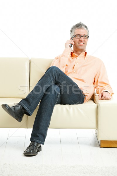 Stock photo: Man talking on mobile phone