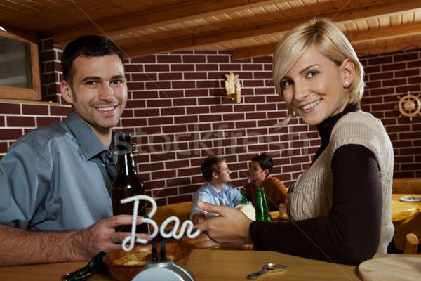 Portrait of young couple in bar Stock photo © nyul