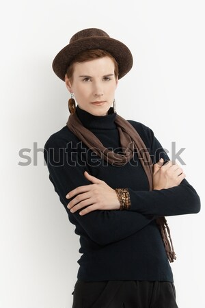 Trendi nő csípő pózol ruházat kalap Stock fotó © nyul