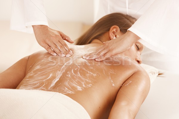 Masseur applying massage cream Stock photo © nyul