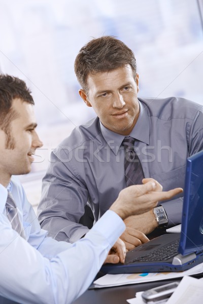 Businessmen working on laptop Stock photo © nyul