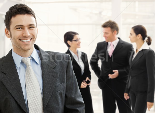 üzleti csapat áll iroda lobbi boldog üzletember Stock fotó © nyul