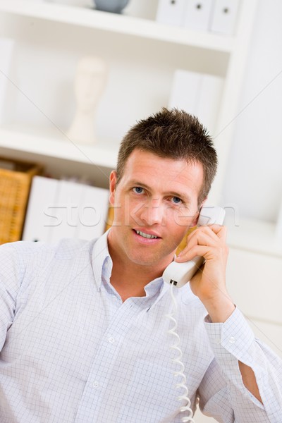 Businessman calling on phone Stock photo © nyul