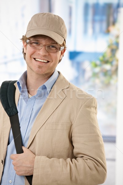 Young businessman leaving office Stock photo © nyul