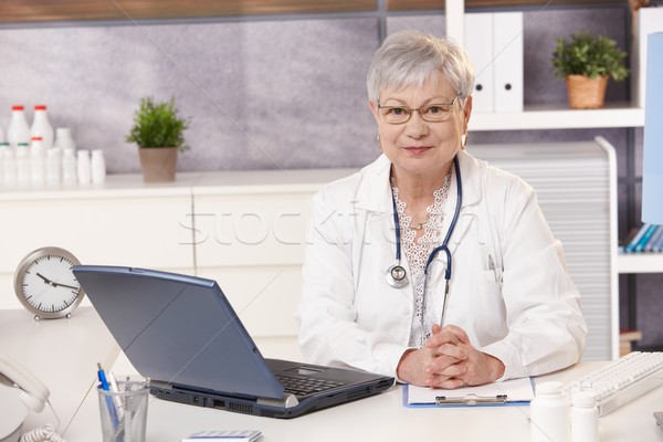 Portrait of senior doctor at work Stock photo © nyul